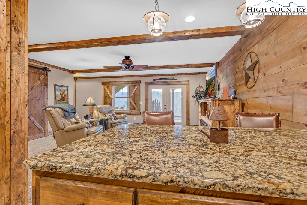 883 Wagon Ridge Road Ferguson, NC 28624 - Photo 35 of 50 a living room filled with furniture