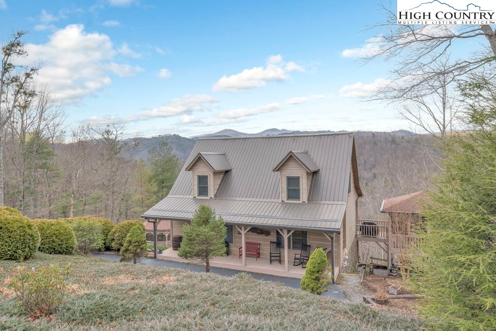 883 Wagon Ridge Road Ferguson, NC 28624 - Photo 4 of 50 an aerial view of a house