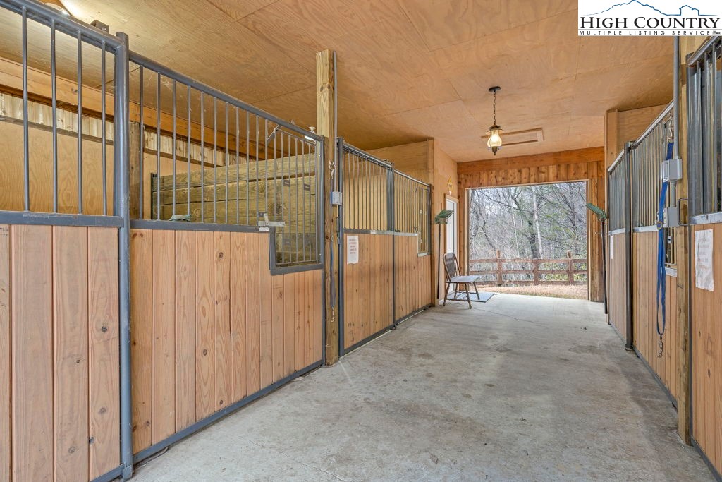 883 Wagon Ridge Road Ferguson, NC 28624 - Photo 42 of 50 a view of hallway with stairs