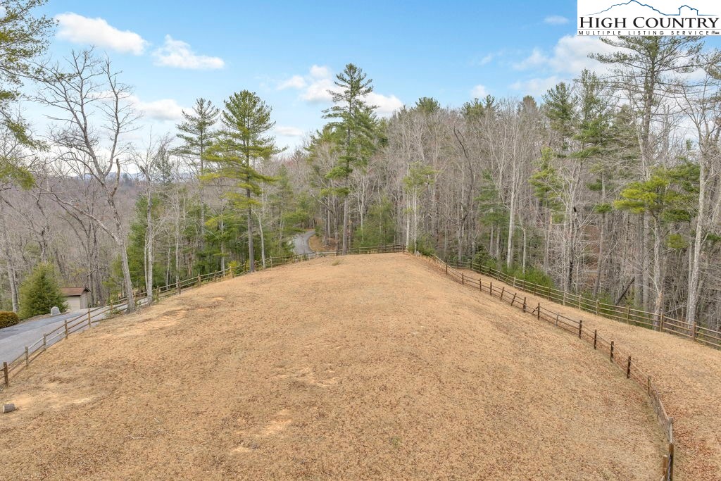 883 Wagon Ridge Road Ferguson, NC 28624 - Photo 47 of 50 a view of a backyard of the house