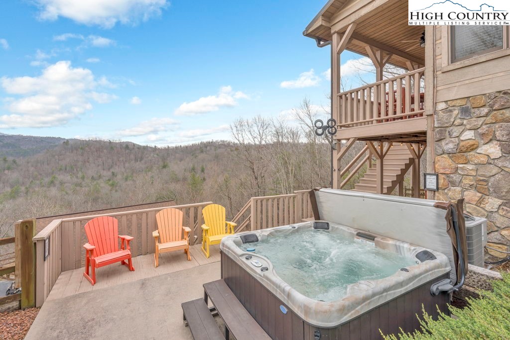 883 Wagon Ridge Road Ferguson, NC 28624 - Photo 49 of 50 a terrace of a house with outdoor seating