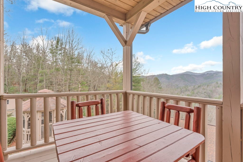 883 Wagon Ridge Road Ferguson, NC 28624 - Photo 50 of 50 a view of a two chairs on the roof deck