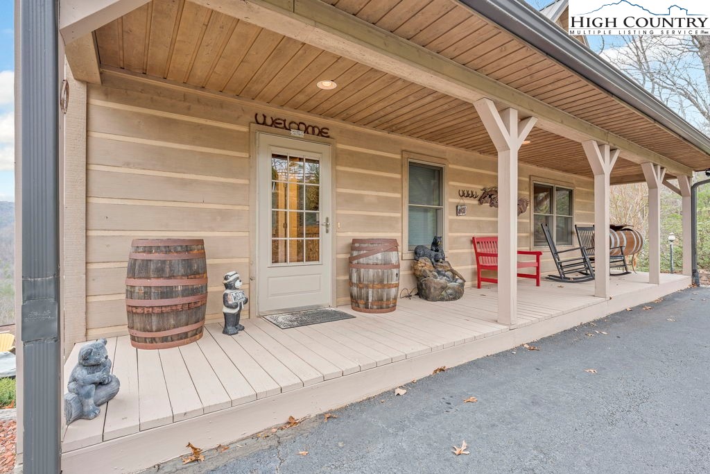 883 Wagon Ridge Road Ferguson, NC 28624 - Photo 6 of 50 a view of a patio with table and chairs and potted plants