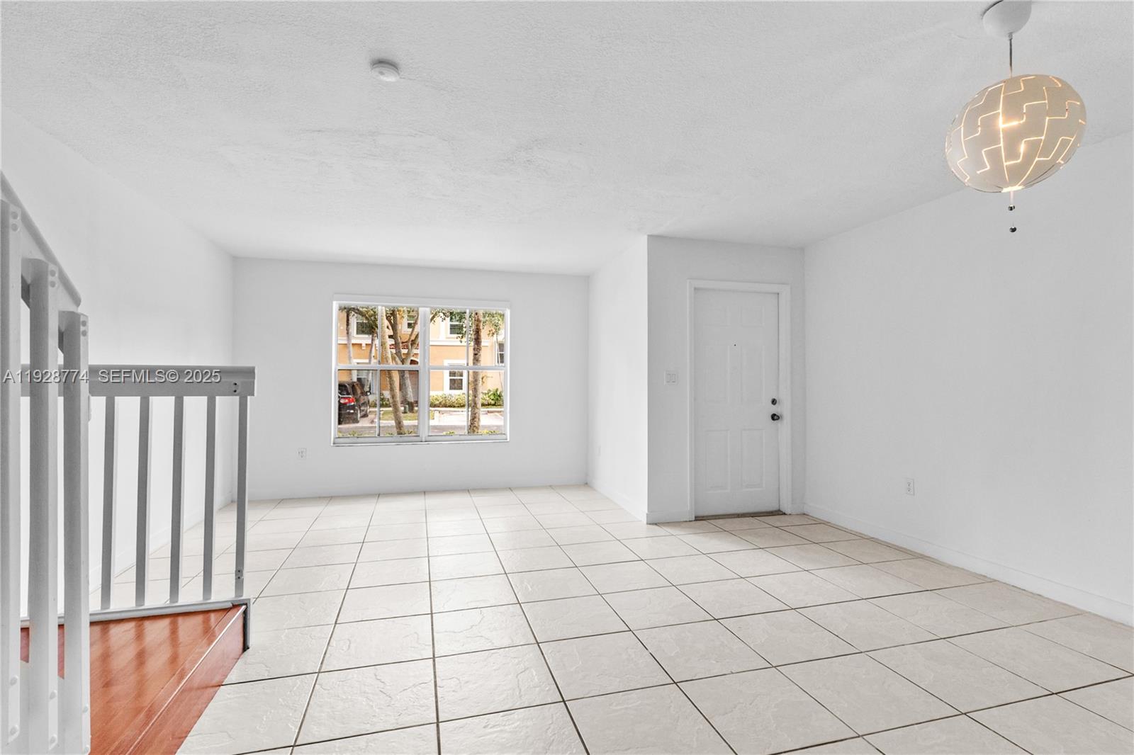 3168 Southwest 129th Way, Unit 151 Miramar, FL 33027 - Photo 11 of 21 a view of an empty room and window