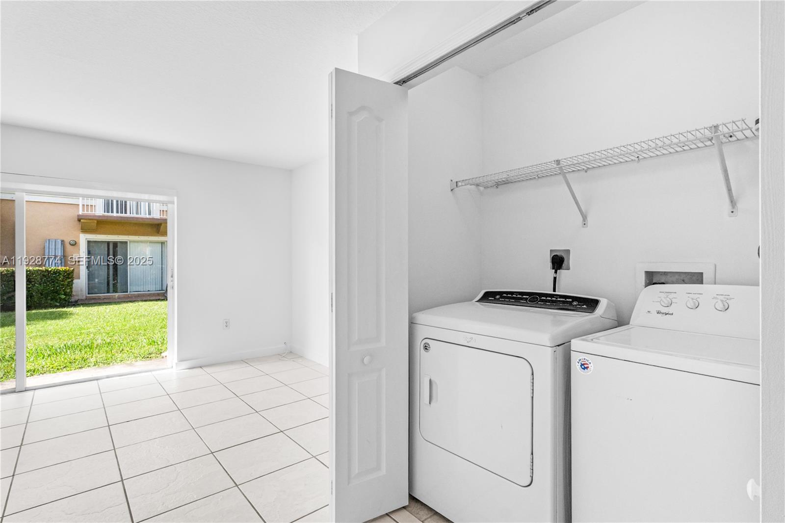 3168 Southwest 129th Way, Unit 151 Miramar, FL 33027 - Photo 9 of 21 a utility room with dryer and washer