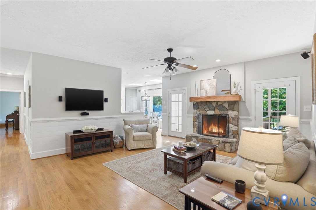 12123 Deer Ridge Court Ashland, VA 23005 - Photo 13 of 63 a living room with furniture and a flat screen tv
