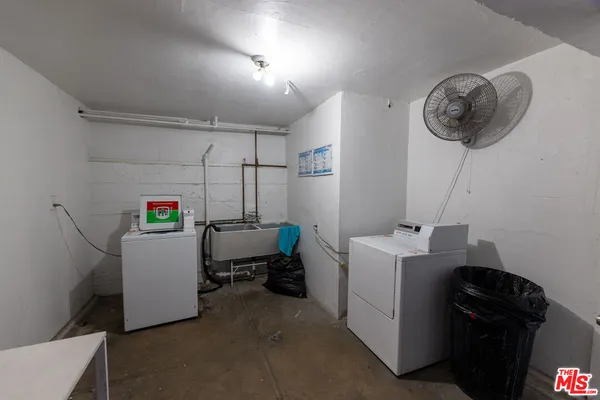 a view of cars parked in front of a building