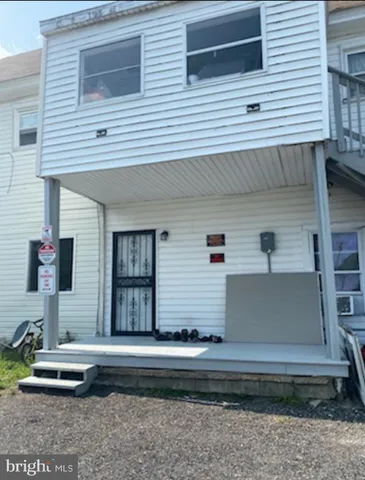 a view of house with outdoor space