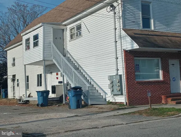 a view of a house with a patio