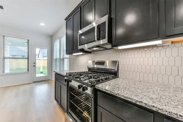 an empty room with an entryway