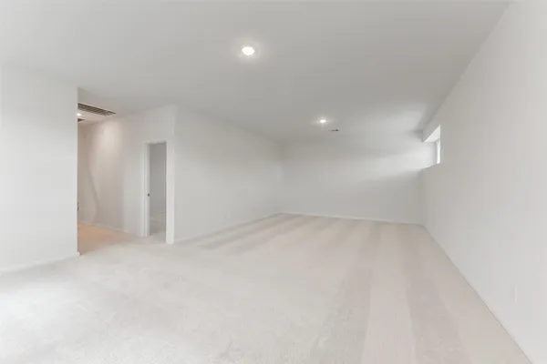 an empty room with an entryway