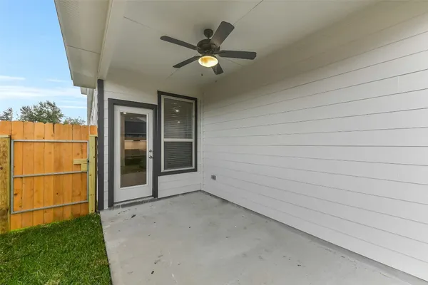 a view of a backyard with a garden and plants
