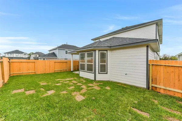 a picture of a book and a bed