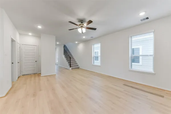 a view of a kitchen with a sink and a stove