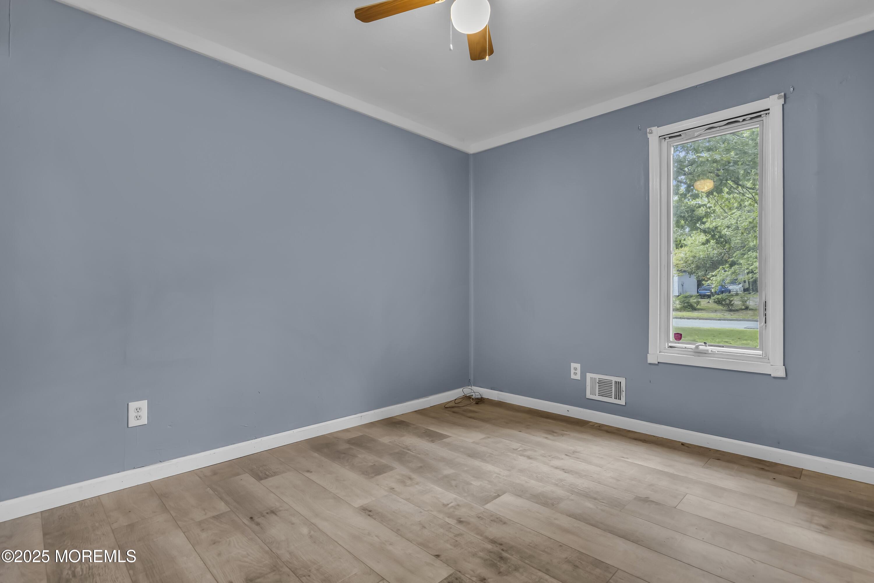 32 1st Street Barnegat, NJ 08005 - Photo 11 of 16 an empty room with a window