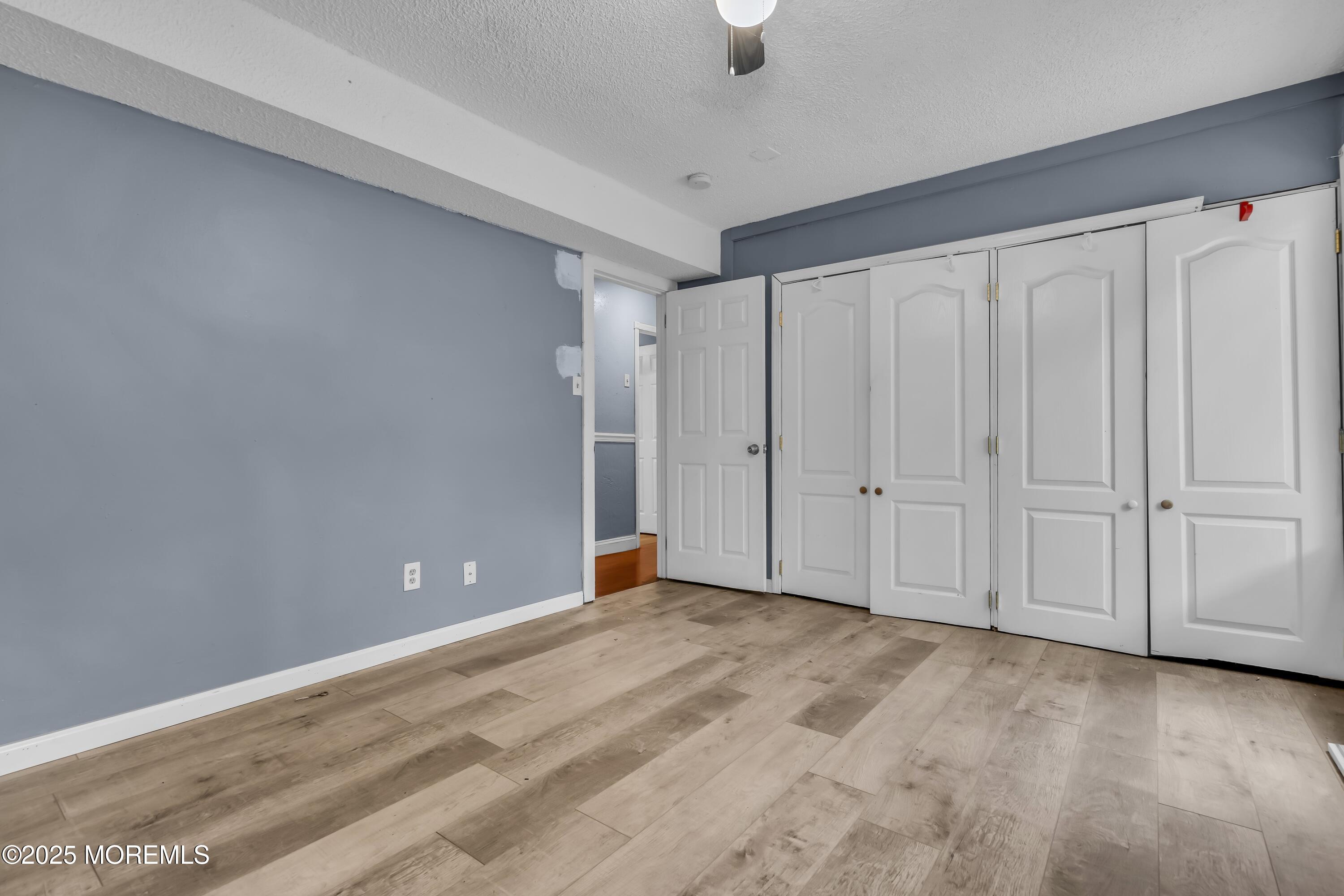 32 1st Street Barnegat, NJ 08005 - Photo 13 of 16 a view of an empty room