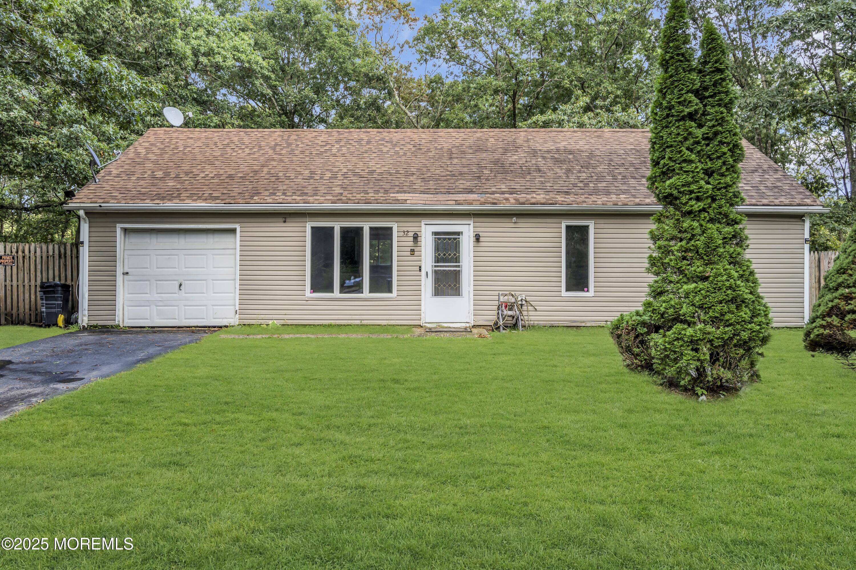 32 1st Street Barnegat, NJ 08005 - Photo 2 of 16 a view of a house with a backyard