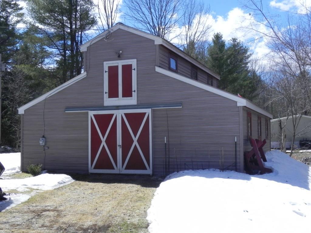 89 Peaked Mountain Road Sebago, ME 04029 - Photo 33 of 34 Awesome barn, with 3 large stalls, a...