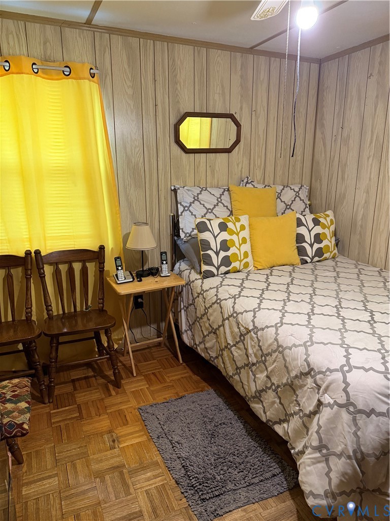 501 West 3rd Street Chase City, VA 23924 - Photo 7 of 14 a bedroom with a bed and a table