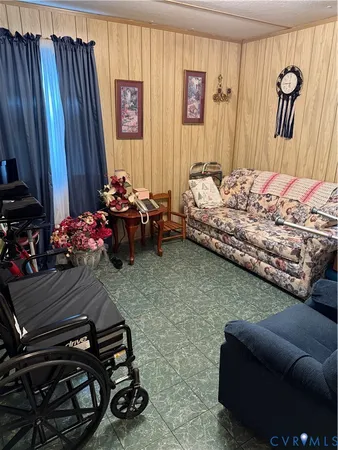 a bedroom with furniture and a closet