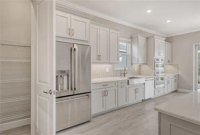 a view of a room with racks on the wall