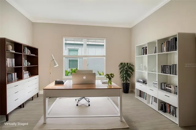 a view of swimming pool with outdoor seating and plants