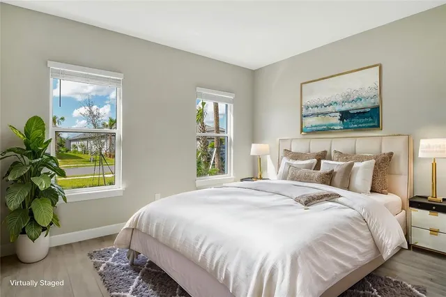a kitchen with lots of counter top space and furniture