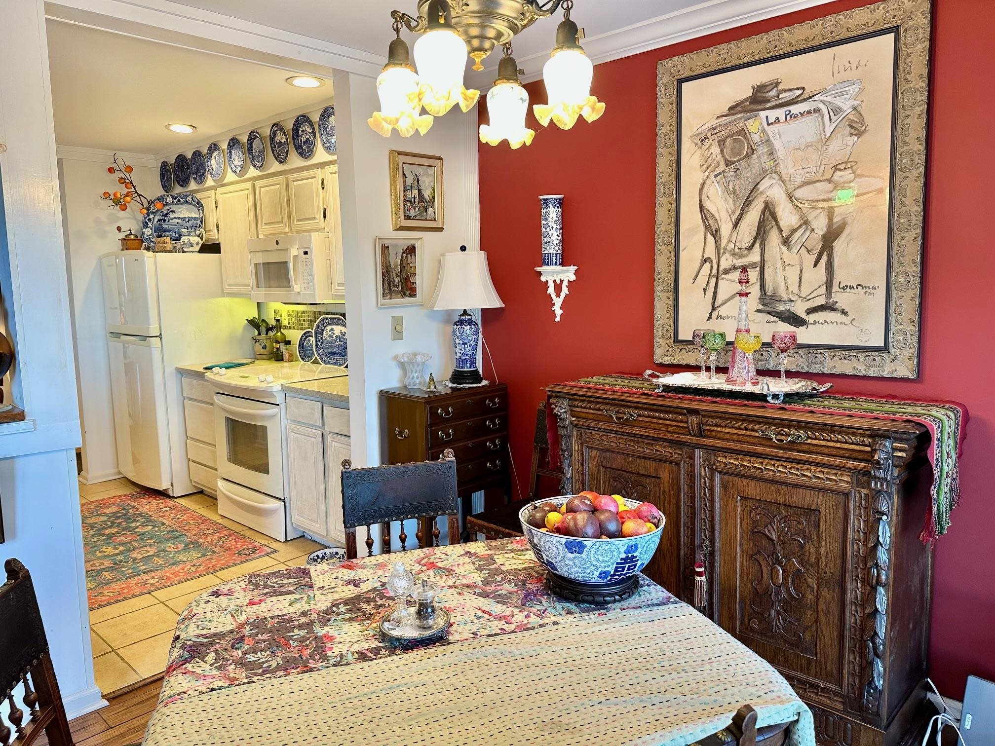 3206 North Ridge Wintergreen, VA 22967 - Photo 12 of 41 a kitchen with stainless steel appliances a stove a refrigerator and a dining table