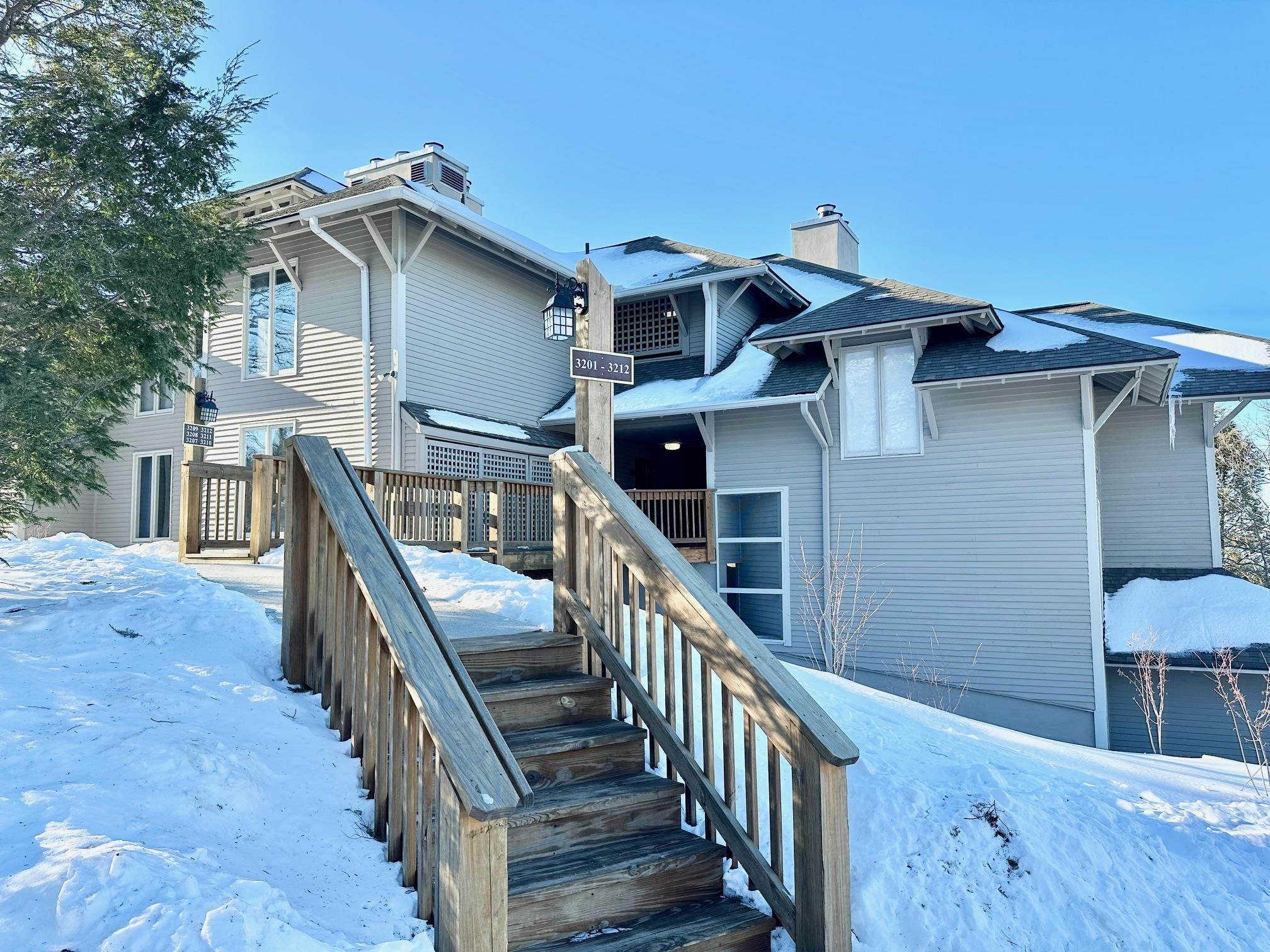 3206 North Ridge Wintergreen, VA 22967 - Photo 2 of 41 a view of a house with wooden deck and furniture