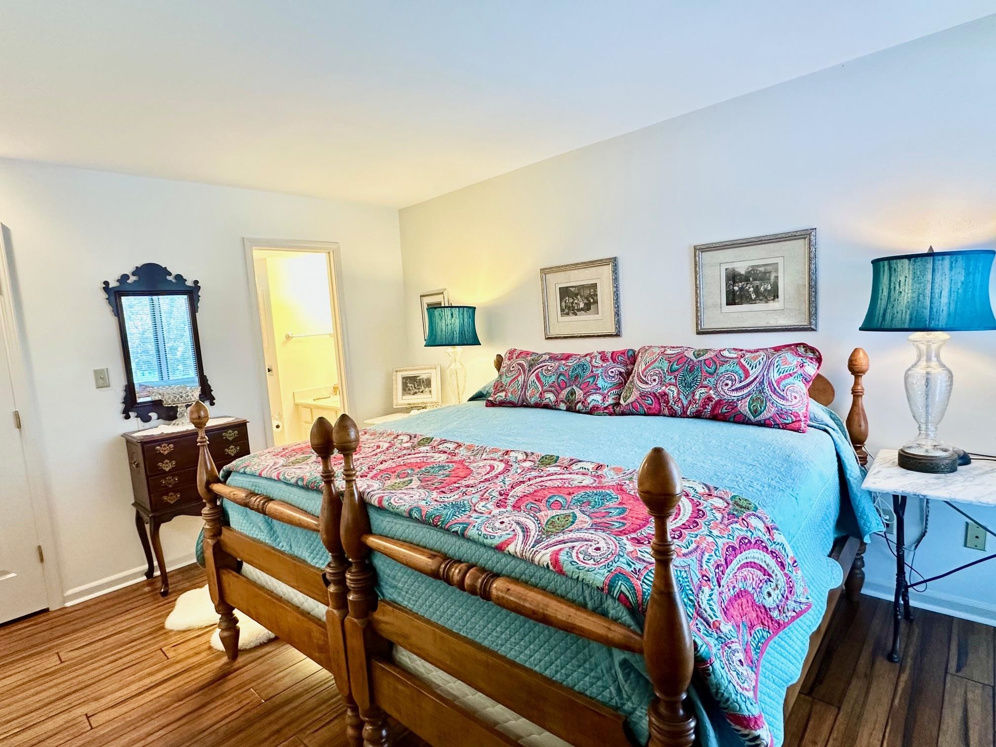 3206 North Ridge Wintergreen, VA 22967 - Photo 21 of 41 a bedroom with a bed and wooden floor