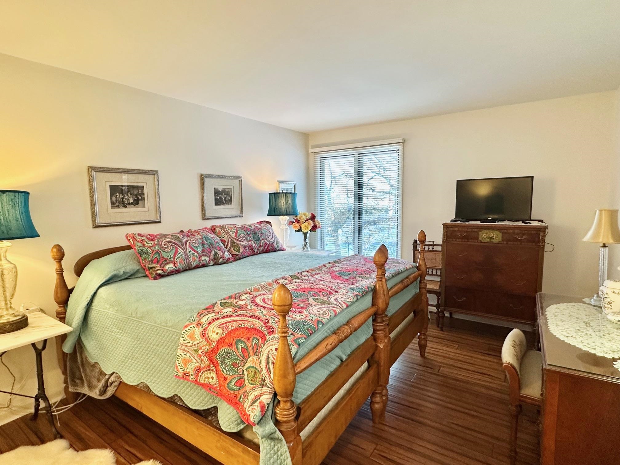 3206 North Ridge Wintergreen, VA 22967 - Photo 24 of 41 a bedroom with a bed and wooden floor