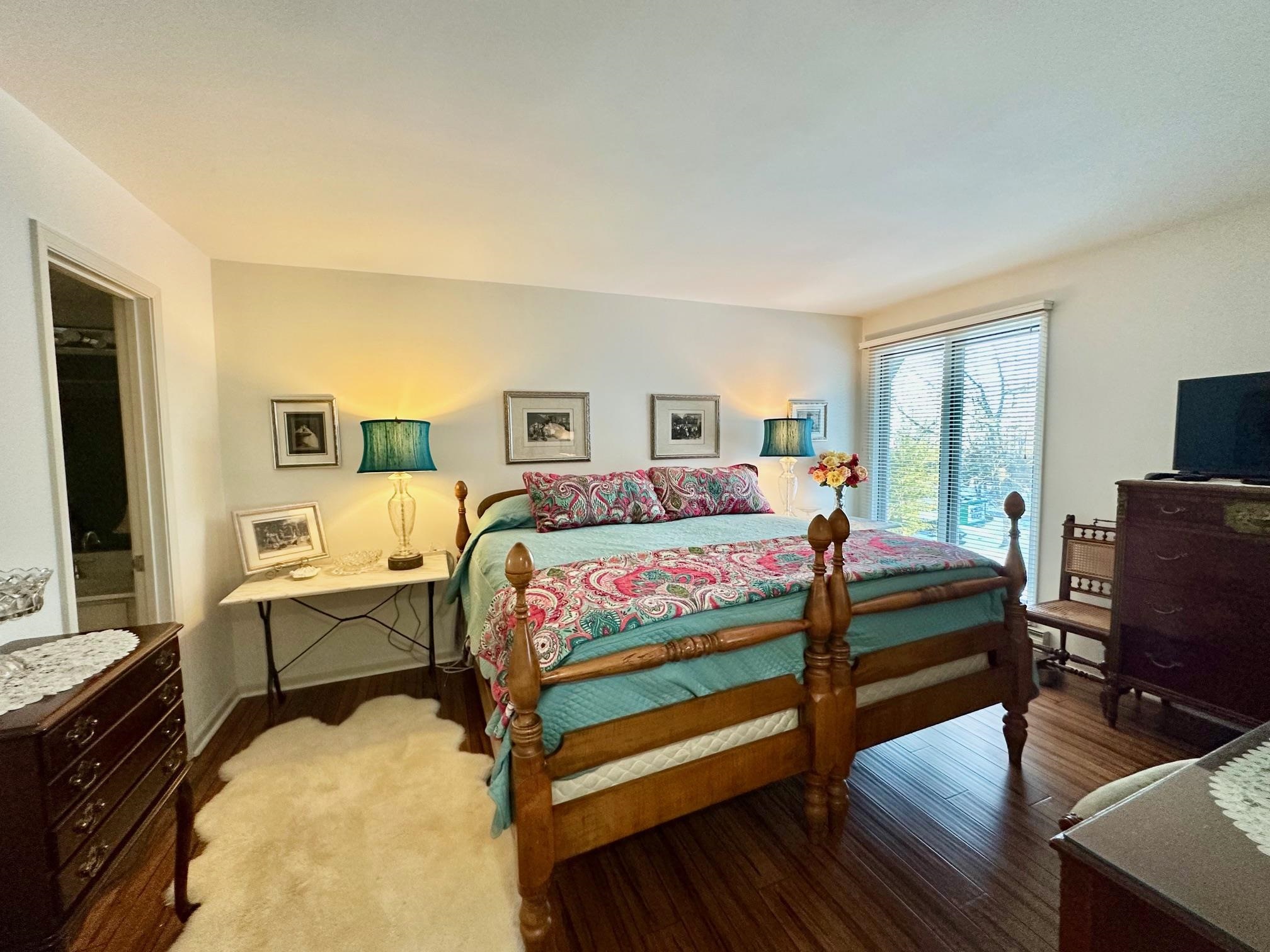 3206 North Ridge Wintergreen, VA 22967 - Photo 25 of 41 a bedroom with a bed and wooden floor