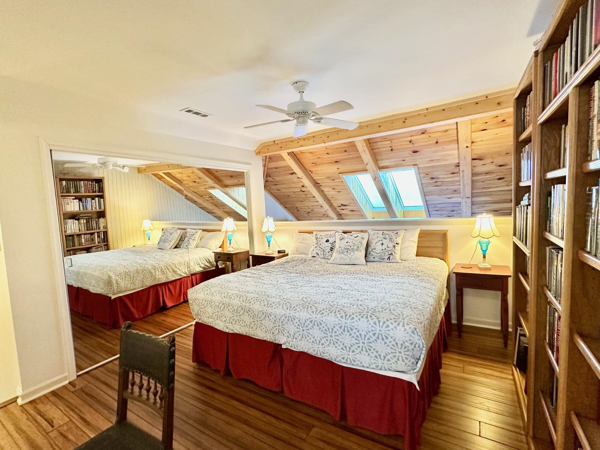 3206 North Ridge Wintergreen, VA 22967 - Photo 32 of 41 a bedroom with a bed and wooden floor