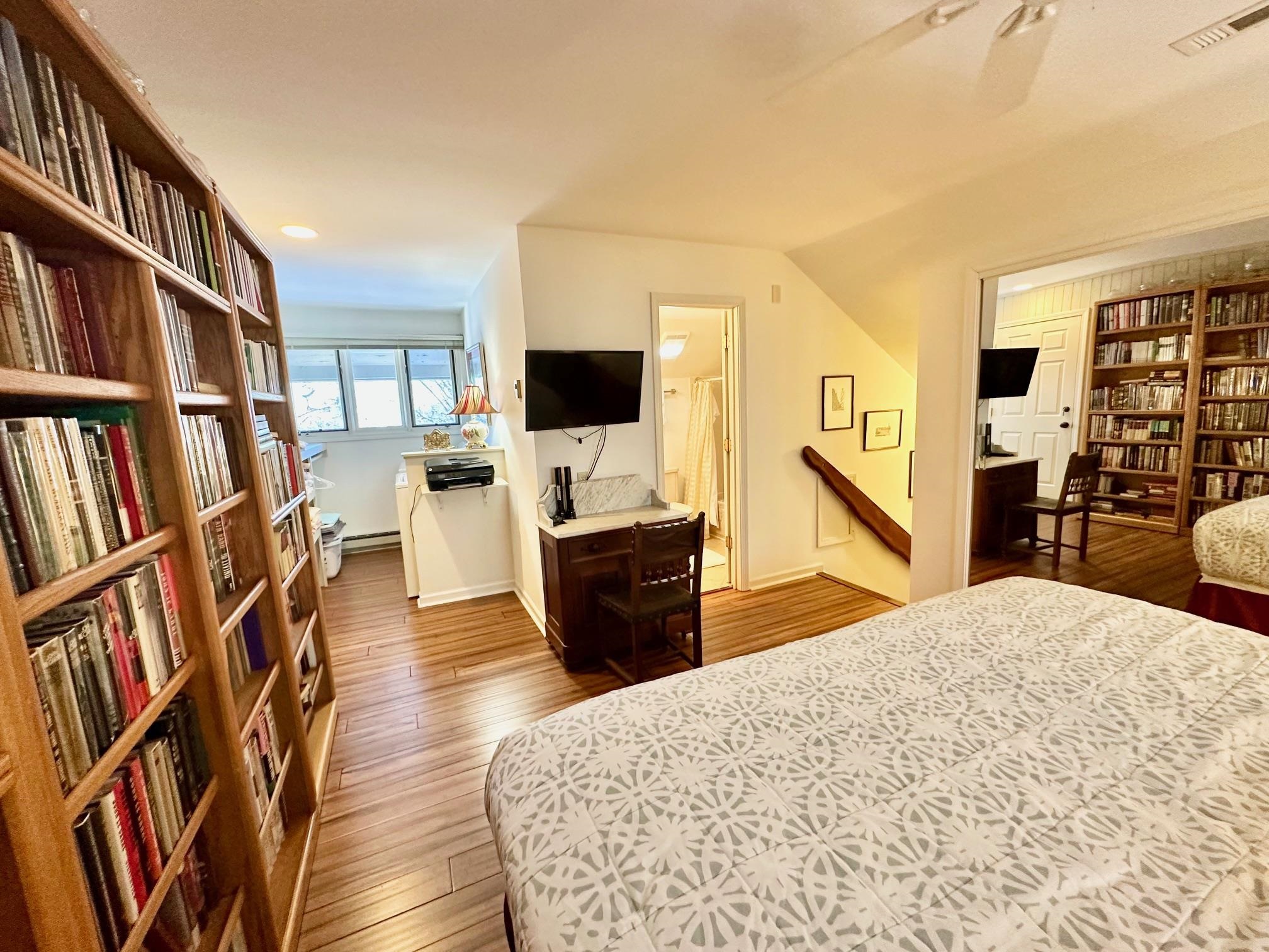 3206 North Ridge Wintergreen, VA 22967 - Photo 34 of 41 a living room with a bed furniture and a flat screen tv
