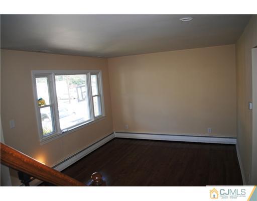 19 Highfield Road Colonia, NJ 07067 - Photo 2 of 17 a view of an empty room and window