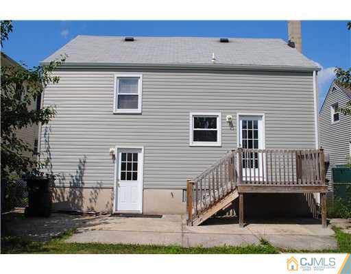 19 Highfield Road Colonia, NJ 07067 - Photo 16 of 17 a view of a house with a yard