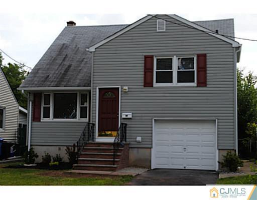 19 Highfield Road Colonia, NJ 07067 - Photo 17 of 17 a front view of a house with a yard