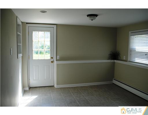 19 Highfield Road Colonia, NJ 07067 - Photo 10 of 17 a view of an empty room with a window
