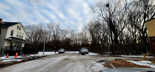 a view of a street with cars