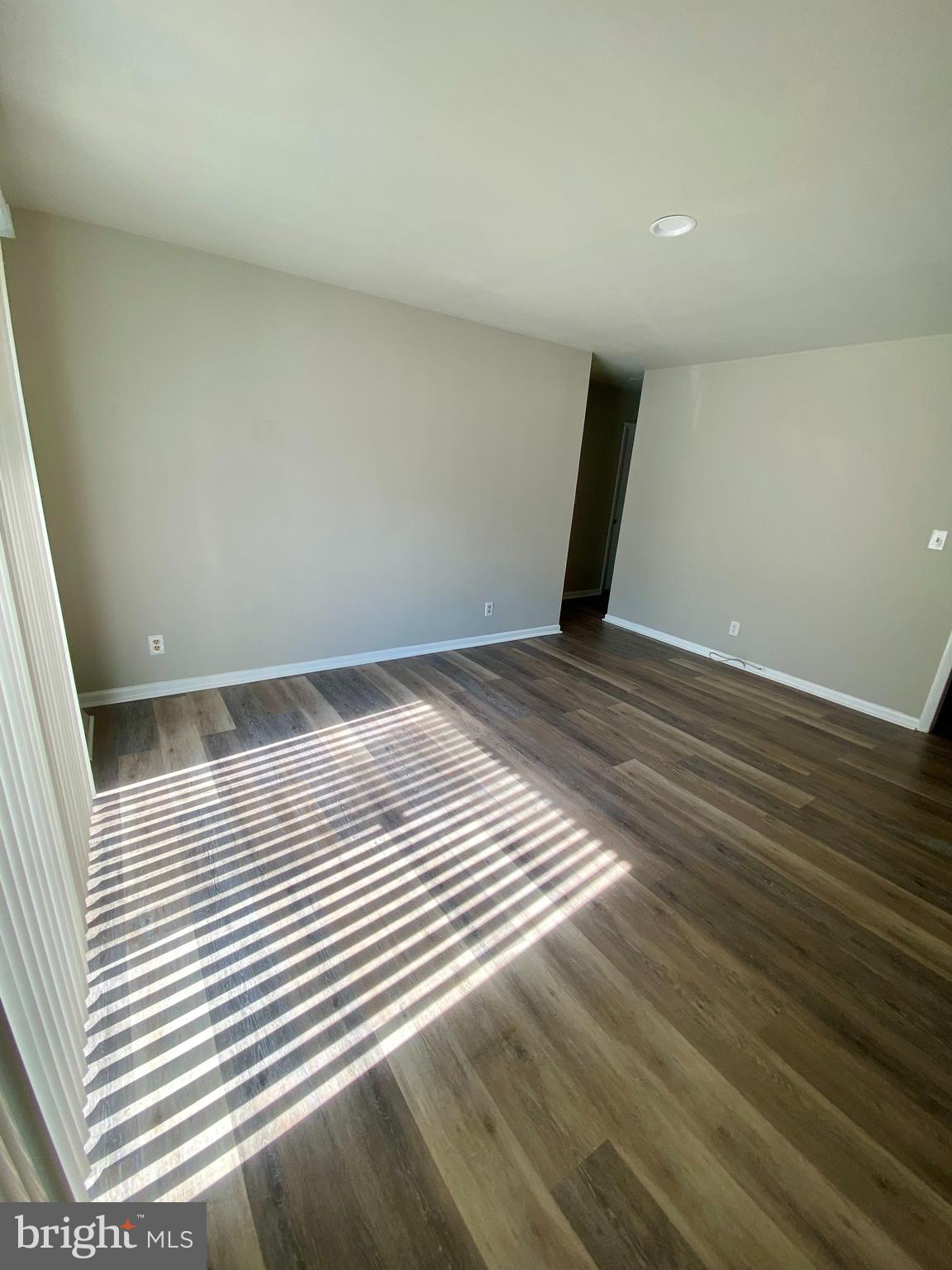 1419 Dandridge Street, Unit A Fredericksburg, VA 22401 - Photo 2 of 8 a view of a livingroom with wooden floor