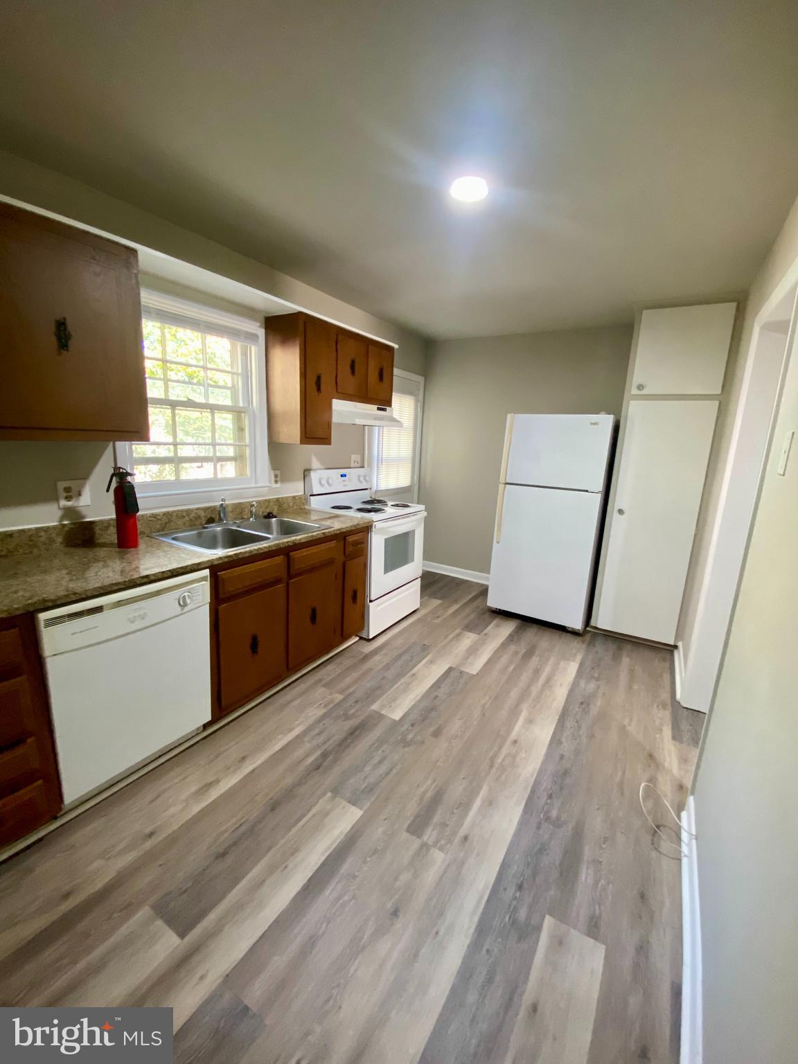 1419 Dandridge Street, Unit A Fredericksburg, VA 22401 - Photo 8 of 8 a kitchen with a sink and cabinets