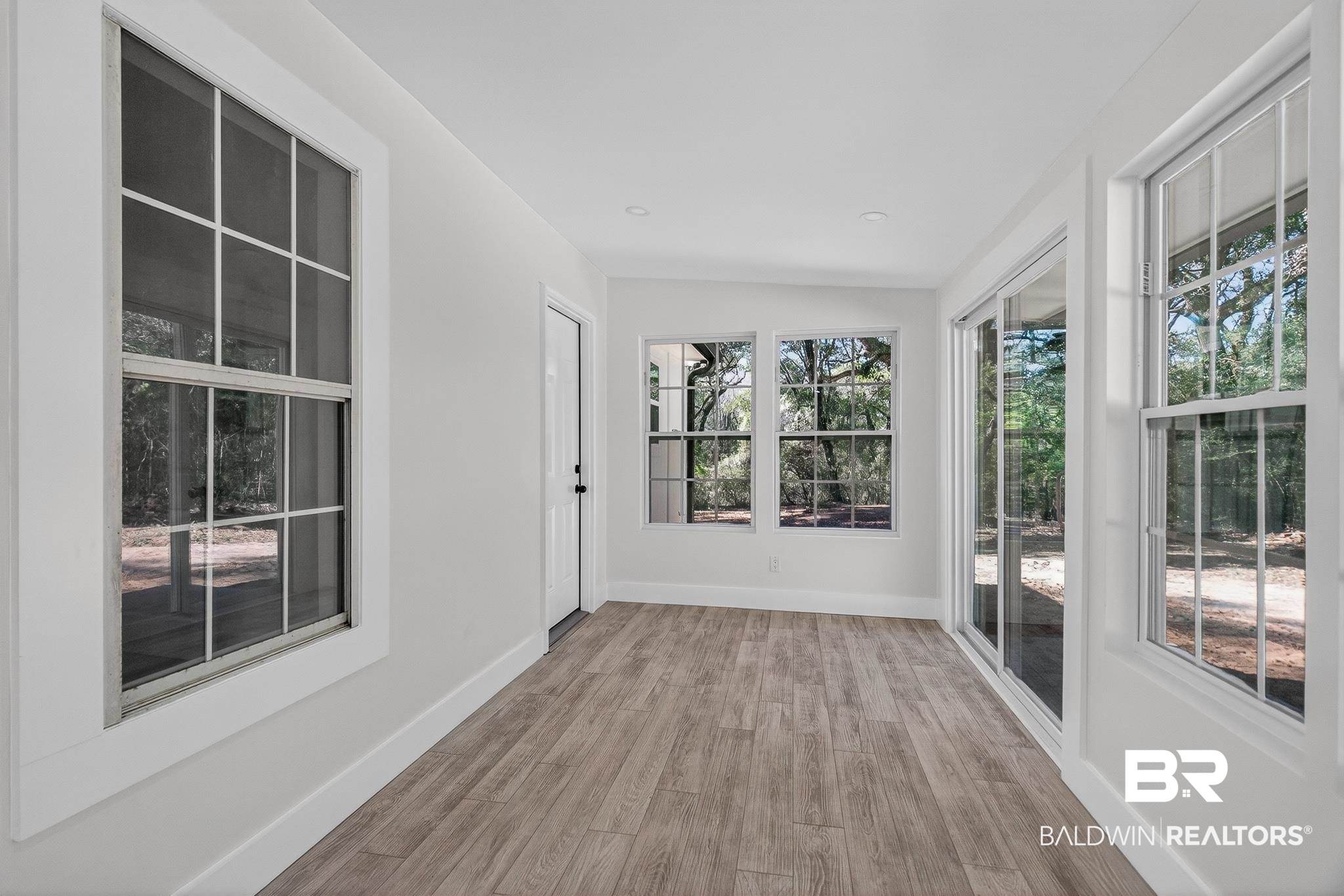 10650 Old Pascagoula Road Theodore, AL 36582 - Photo 73 of 77 Unfurnished sunroom with wood finished floors, lofted ceiling, and recessed lighting