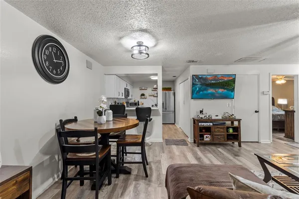 a view of a dining room with furniture