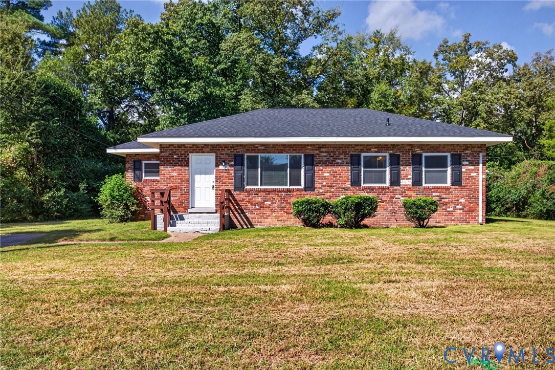 1118 Andros Road Richmond, VA 23225 - Photo 1 of 28 Brick exterior with dark shutters, new windows, an