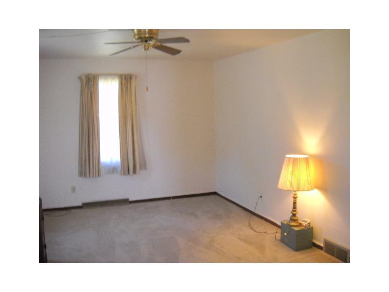 148 Miller Road Rochester, PA 15074 - Photo 2 of 11 Living Room. Large livingroom, newer windows.