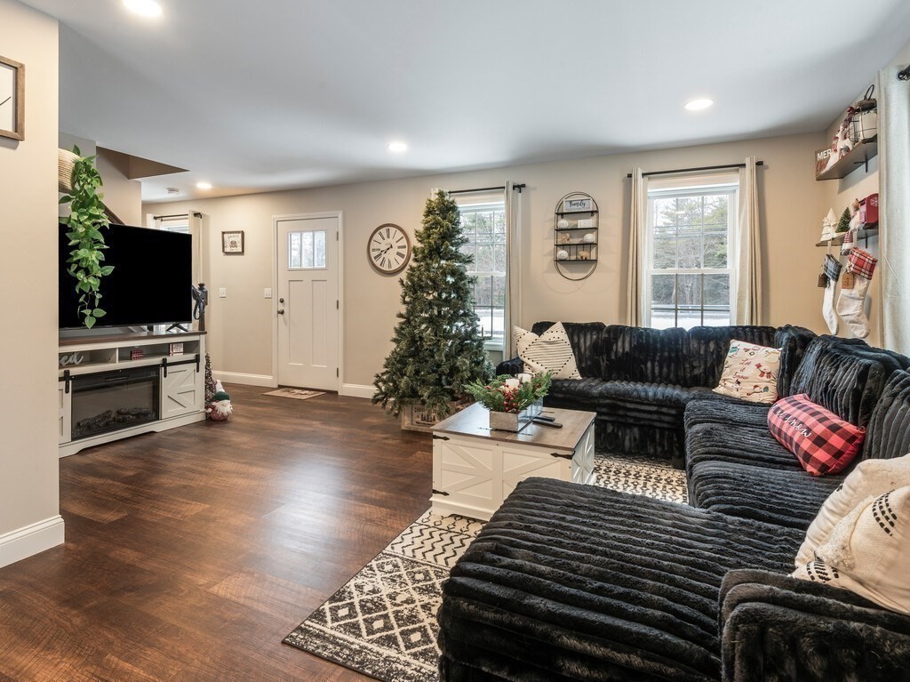46 Baldwinville State Road Winchendon, MA 01475 - Photo 13 of 37 a living room with furniture a flat screen tv and a window