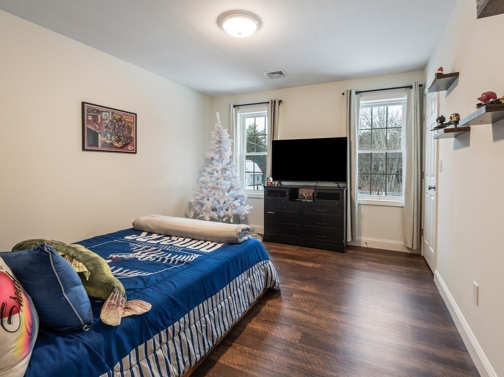 46 Baldwinville State Road Winchendon, MA 01475 - Photo 18 of 37 a bedroom with a bed and a flat screen tv