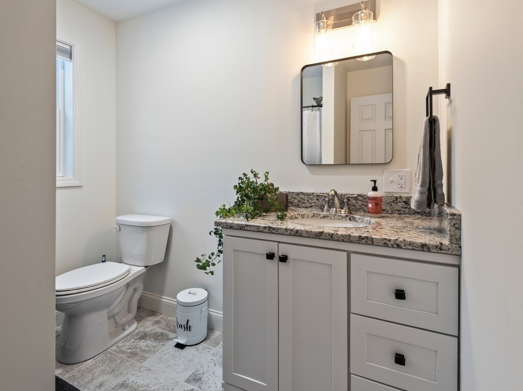 46 Baldwinville State Road Winchendon, MA 01475 - Photo 20 of 37 a bathroom with a granite countertop toilet sink and mirror