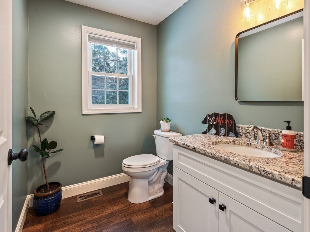 46 Baldwinville State Road Winchendon, MA 01475 - Photo 34 of 37 a bathroom with a granite countertop toilet sink and mirror
