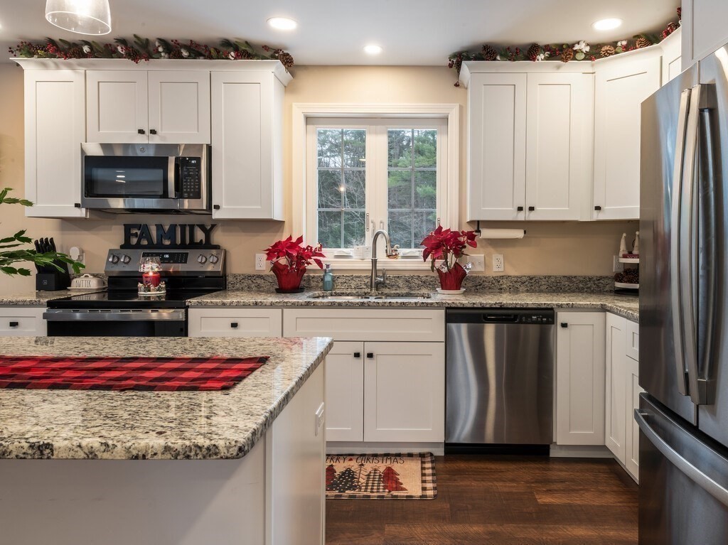 46 Baldwinville State Road Winchendon, MA 01475 - Photo 5 of 37 a kitchen with stainless steel appliances granite countertop a sink stove and white cabinets